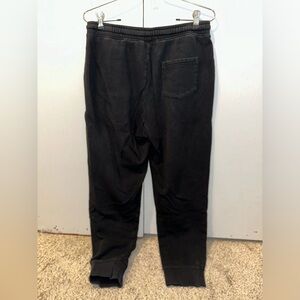 100 Thieves black sweatpants with red logo. Size small in Mens.